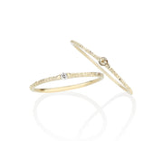 dainty delicate diamond stackable rings made by designer jayne moore in nyc using recycled gold and conflict free diamonds handmade by the model jayne moore writer