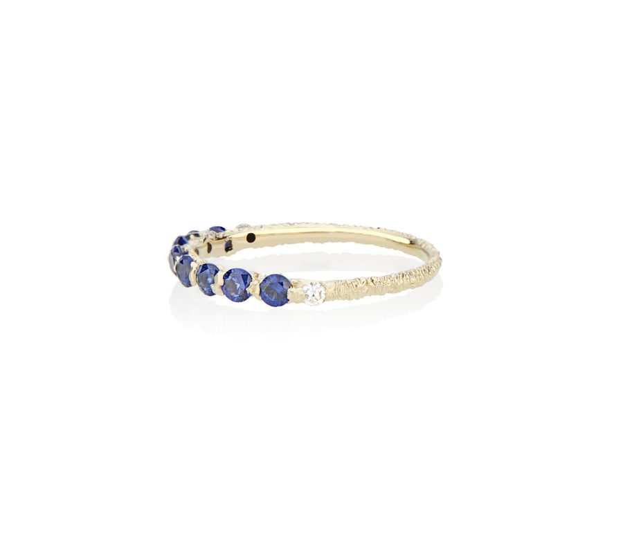 Royal Blue Sapphires cast not set in to 18kt Gold in model turned jeweler Jayne Moore's signature rebel set style using recycled refined golds and sustainable responsibly sourced stones, handmade in NYC stones inspired by the Sicilian sea conflict free diamonds and richly hand textured band 