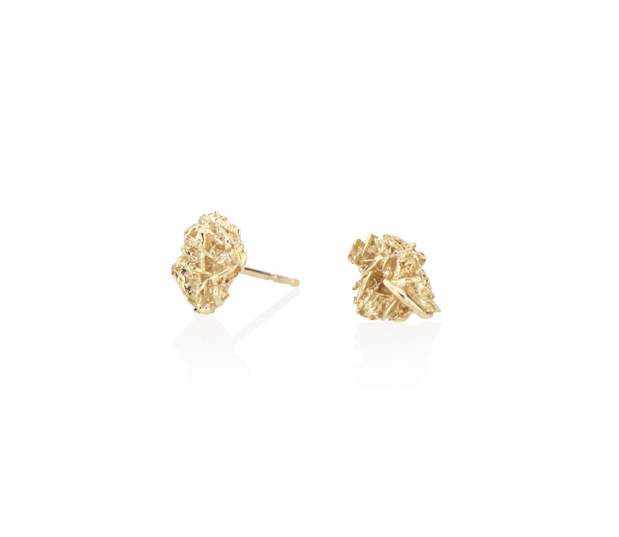 unique gold stud earrings cool everyday earrings with a difference made from a desert rose natural material cast into solid gold keeping the raw and fascinating texture of this natural phenomenon all handmade in NYC by model jayne moore writer jayne moore jeweler all recycled gold