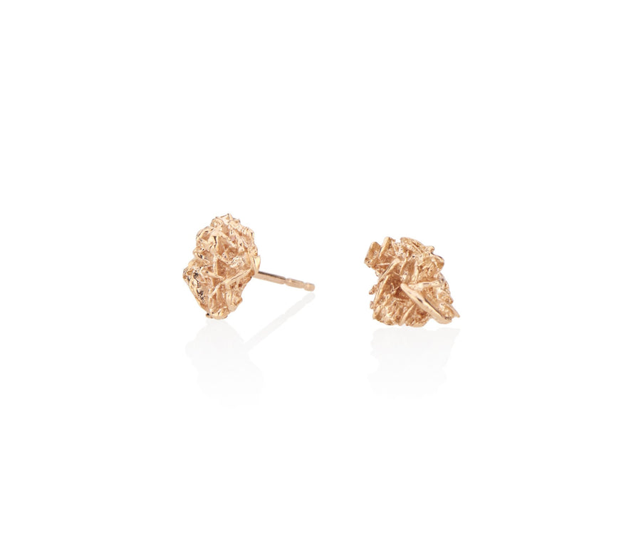 unique gold stud earrings cool everyday earrings with a difference made from a desert rose natural material cast into solid gold keeping the raw and fascinating texture of this natural phenomenon all handmade in NYC by model jayne moore writer jayne moore jeweler all recycled gold