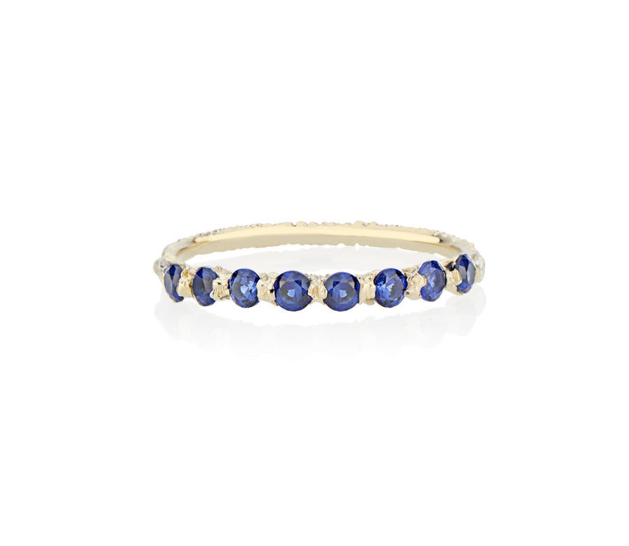 Royal Blue Sapphires cast not set in to 18kt Gold in model turned jeweler Jayne Moore's signature rebel set style using recycled refined golds and sustainable responsibly sourced stones, handmade in NYC stones inspired by the Sicilian sea 