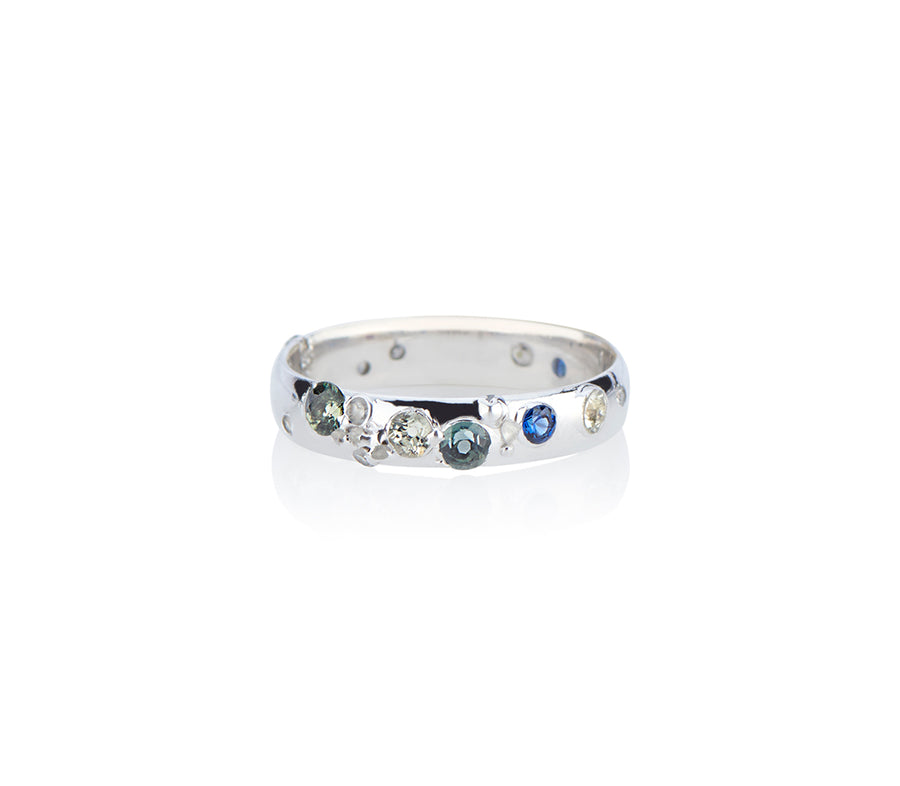 Sapphire ring cast not set castnotset rebel set sapphires and diamonds set in white gold inspired by the ocean model jayne moore hand sets her conflict free stones by hand in a freestyle unique wedding band or stand out everyday ring band diamond shards sparkle and texture handmade in nyc with recycled gold model jayne more jewelry designer jayne moore writer 